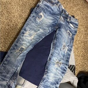 Distressed Blue Jeans